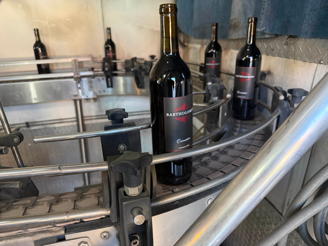Black label Carmenere going down the bottling line